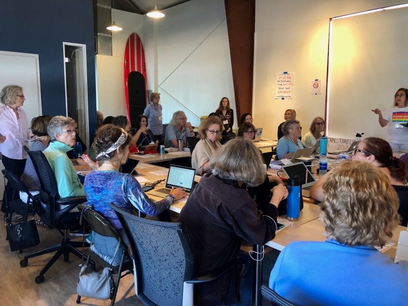 Group of people phonebanking for Karen Mallard