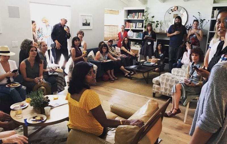 Room full of phonebank volunteers for EMILY's List weekend of action