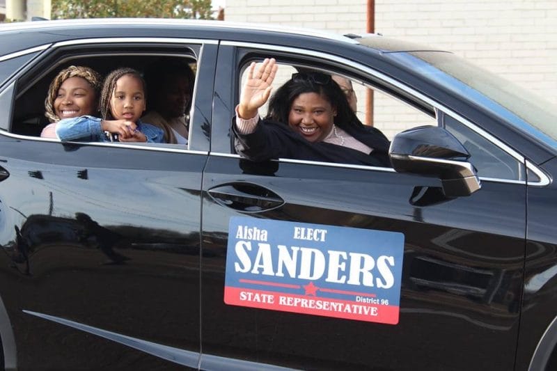 Aisha Sanders and friends driving in a car