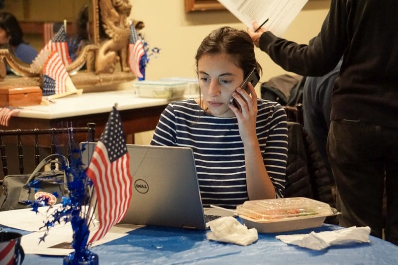 Volunteers make calls on Election eve for Josh Cole and Hala Ayala at the Women's National Democratic Club in Washington